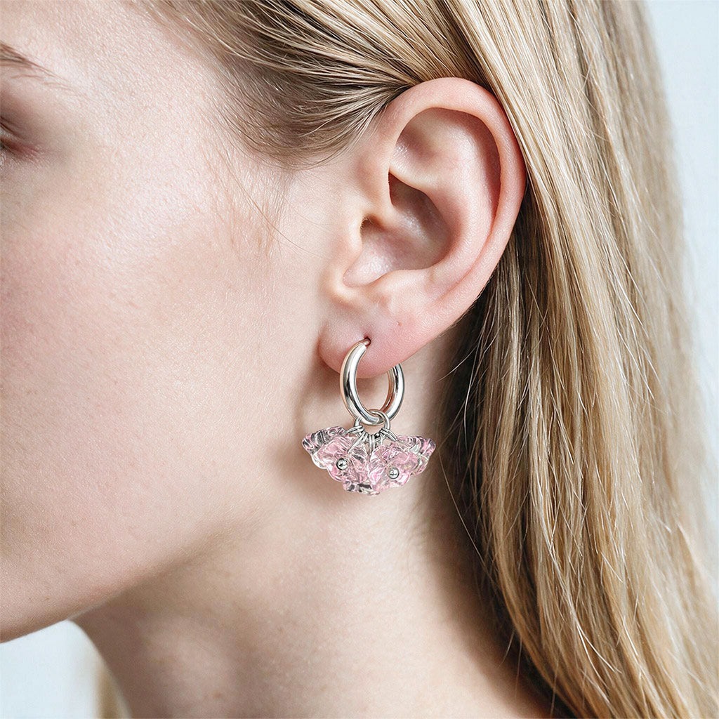 Woman wearing Bloom Earrings – Cotton Candy in stainless steel huggie hoops