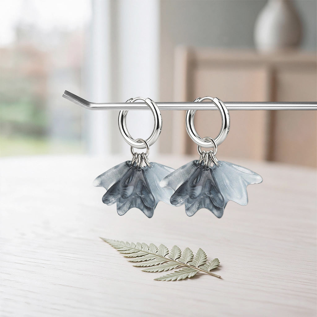 Handmade lampwork glass flower earrings in black and gray with stainless steel huggie hoops
