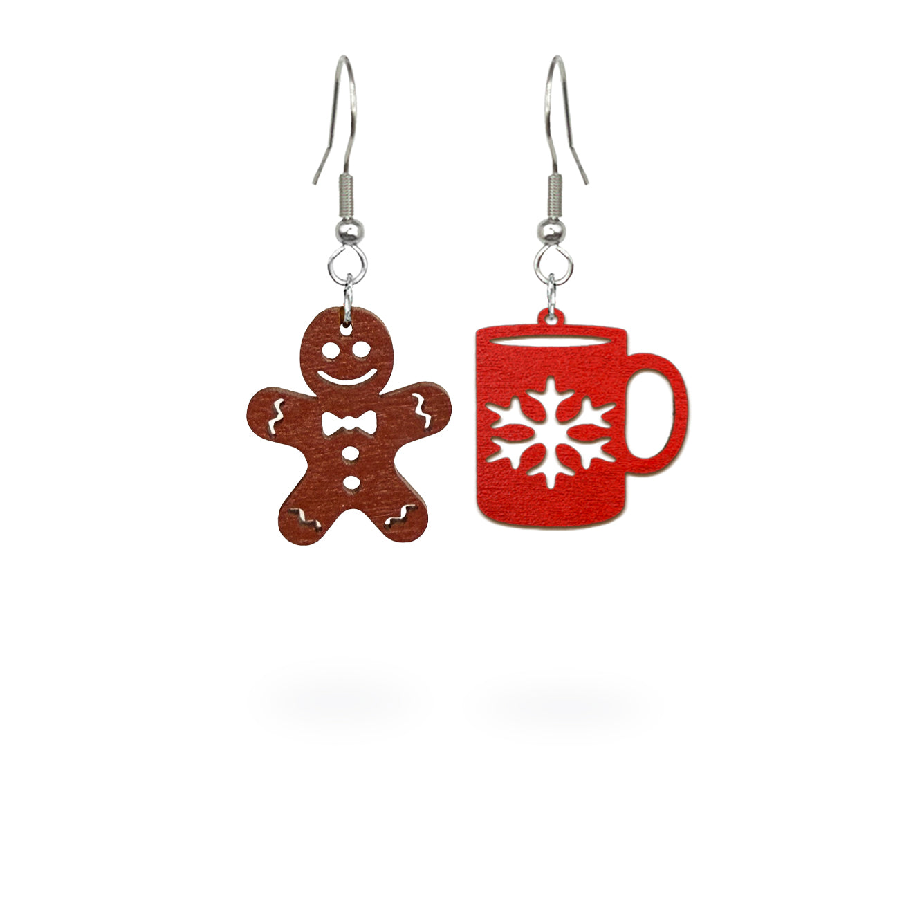 Playful mismatched earrings featuring a gingerbread cookie and a red mug, handmade from Finnish birch plywood and painted on both sides. Handmade in Finland by byMinta.