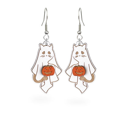 Ghost Cat Earrings holding a jack-o'-lantern, handcrafted from Finnish birch plywood.