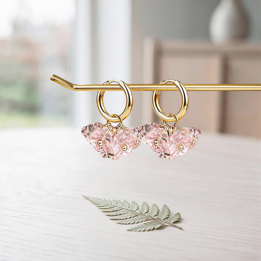 Bloom Earrings – Cotton Candy in gold-plated stainless steel on a linen background