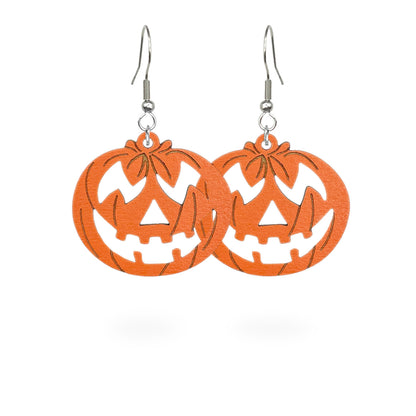 Pumpkin earrings on white background, handmade Halloween earrings from Finnish birch plywood.