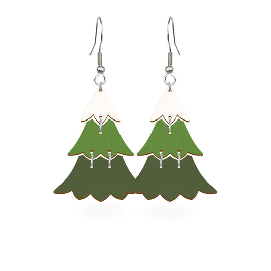 Christmas tree earrings handmade from Finnish birch plywood, painted on both sides and inspired by the peaceful beauty of winter forests. Handmade in Finland by byMinta.