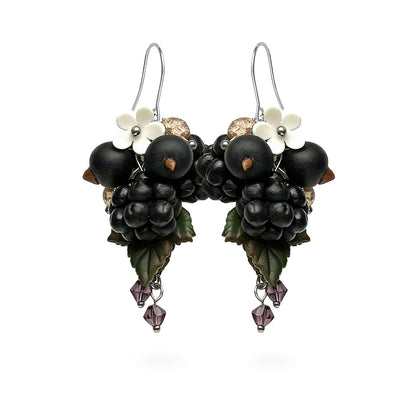 Berry Harvest Earrings featuring hand-shaped blackcurrants, boysenberries, and delicate white flowers. Handmade in Finland by byMinta.
