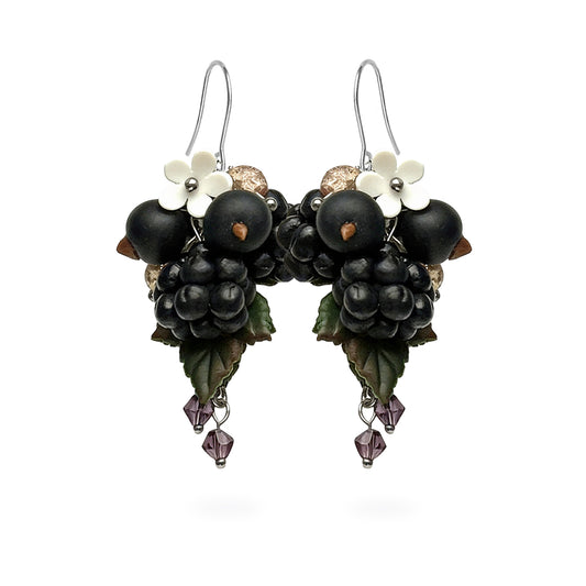 Berry Harvest Earrings featuring hand-shaped blackcurrants, boysenberries, and delicate white flowers. Handmade in Finland by byMinta.