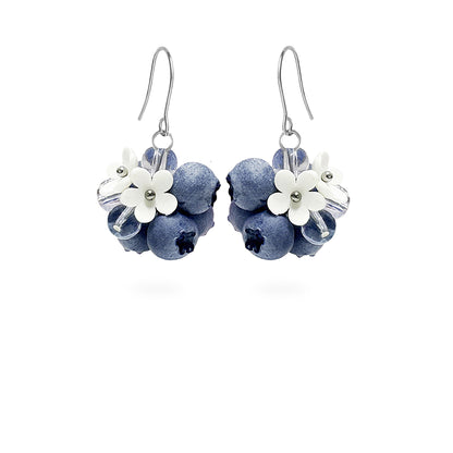 Blueberry Bouquet Earrings featuring hand-shaped blueberries, delicate white flowers, and crystal details. Handmade in Finland by byMinta.