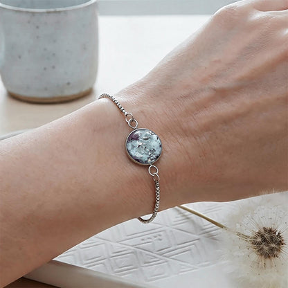 Handcrafted Hydrangea Petal Bracelet with real hydrangea petals worn on a wrist