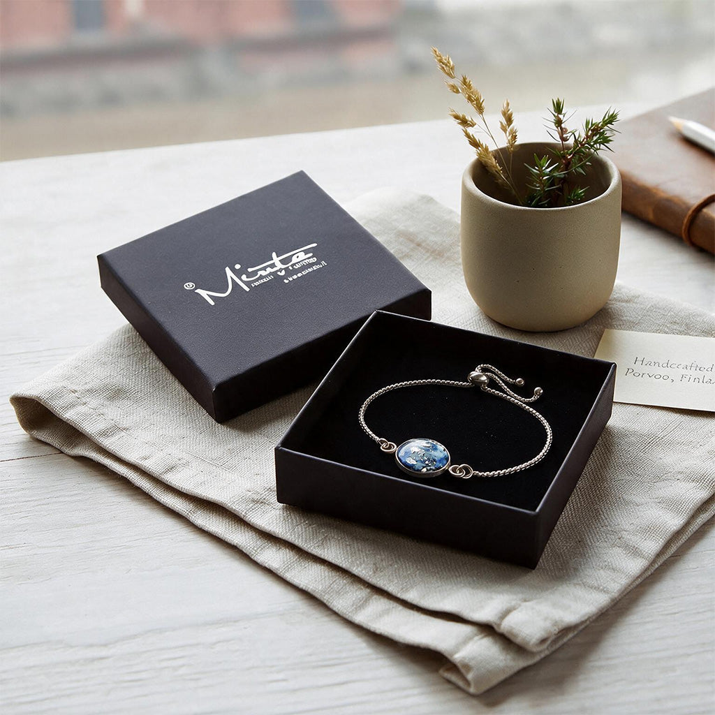 Handcrafted bracelet in an open byMinta jewelry box on a linen cloth.