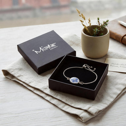 Handcrafted Forget-Me-Not Bracelet with real Forget-Me-Not flowers displayed in a black jewelry gift box