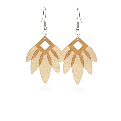 Handmade geometric leaf earrings crafted from Finnish birch plywood. Lightweight statement earrings with layered leaf details and natural Nordic-inspired design.