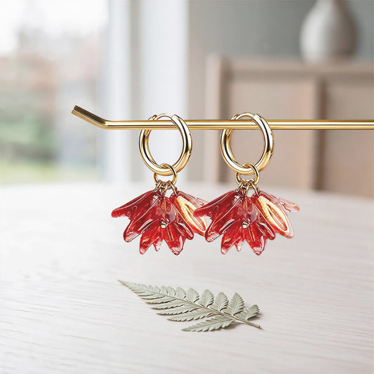 Handmade lampwork glass flower earrings in red with a golden shade, 18K gold-plated huggie hoops
