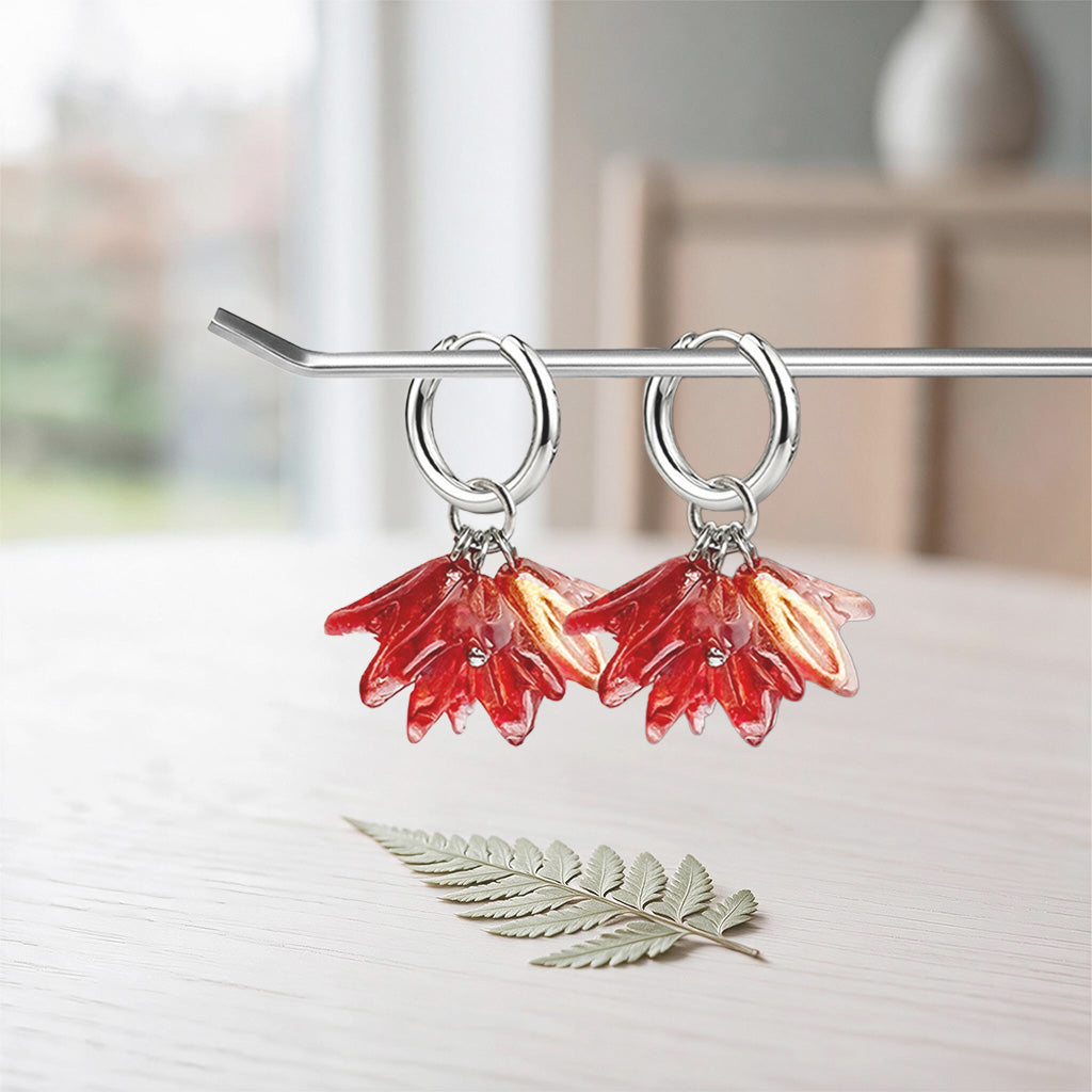 Handmade lampwork glass flower earrings in red with a golden shade, stainless steel huggie hoops