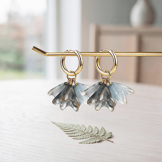 Handmade lampwork glass flower earrings in black and gray with 18K gold-plated huggie hoops